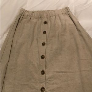 Beige maxi skirt with buttons